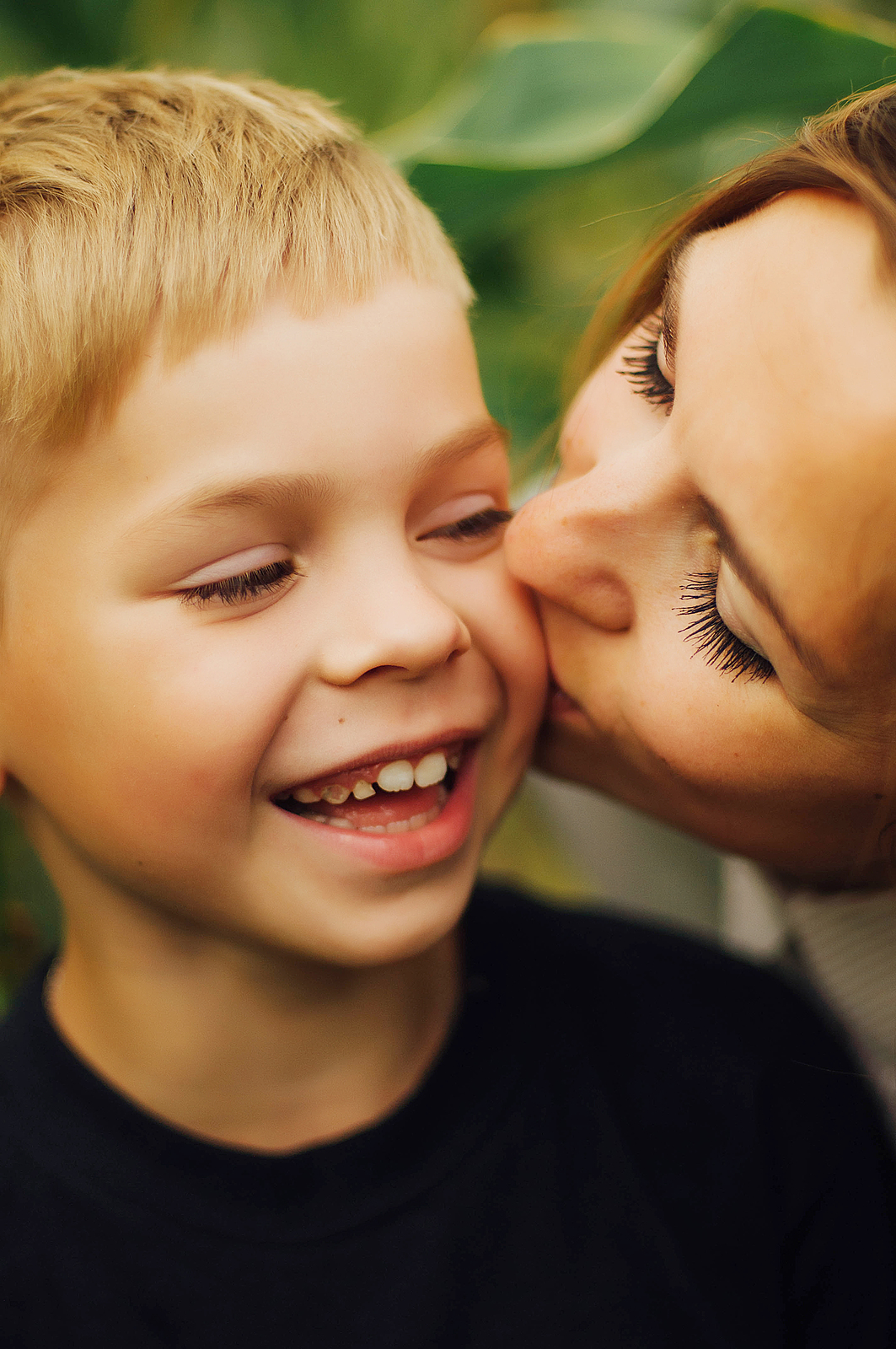 Portrait Of A Happy Mother And Her Son  Outdoor.  Series Of A Mo